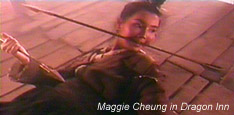 Maggie Cheung arrow in teeth