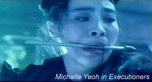 Michelle Yeoh arrow in teeth